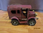 Burgundy Metal Antique Car Tabletop Decor 10" X 4" 6". Fixed Price $24.99.