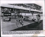 1956 Press Photo Idoff Larsen Managed Pump His Way Past Fallen Riders. Fixed Price $24.99.